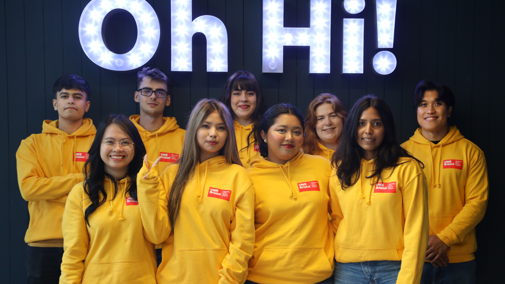 a group of people posing for a photo