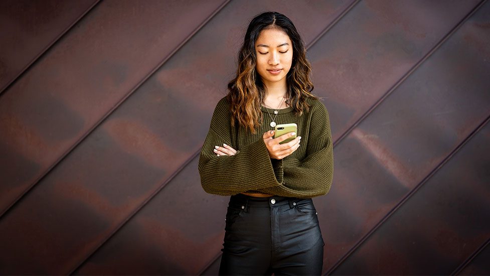 a woman using a phone