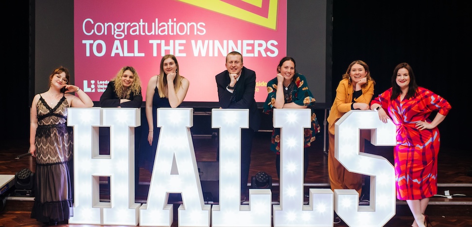 a group of people posing for the camera