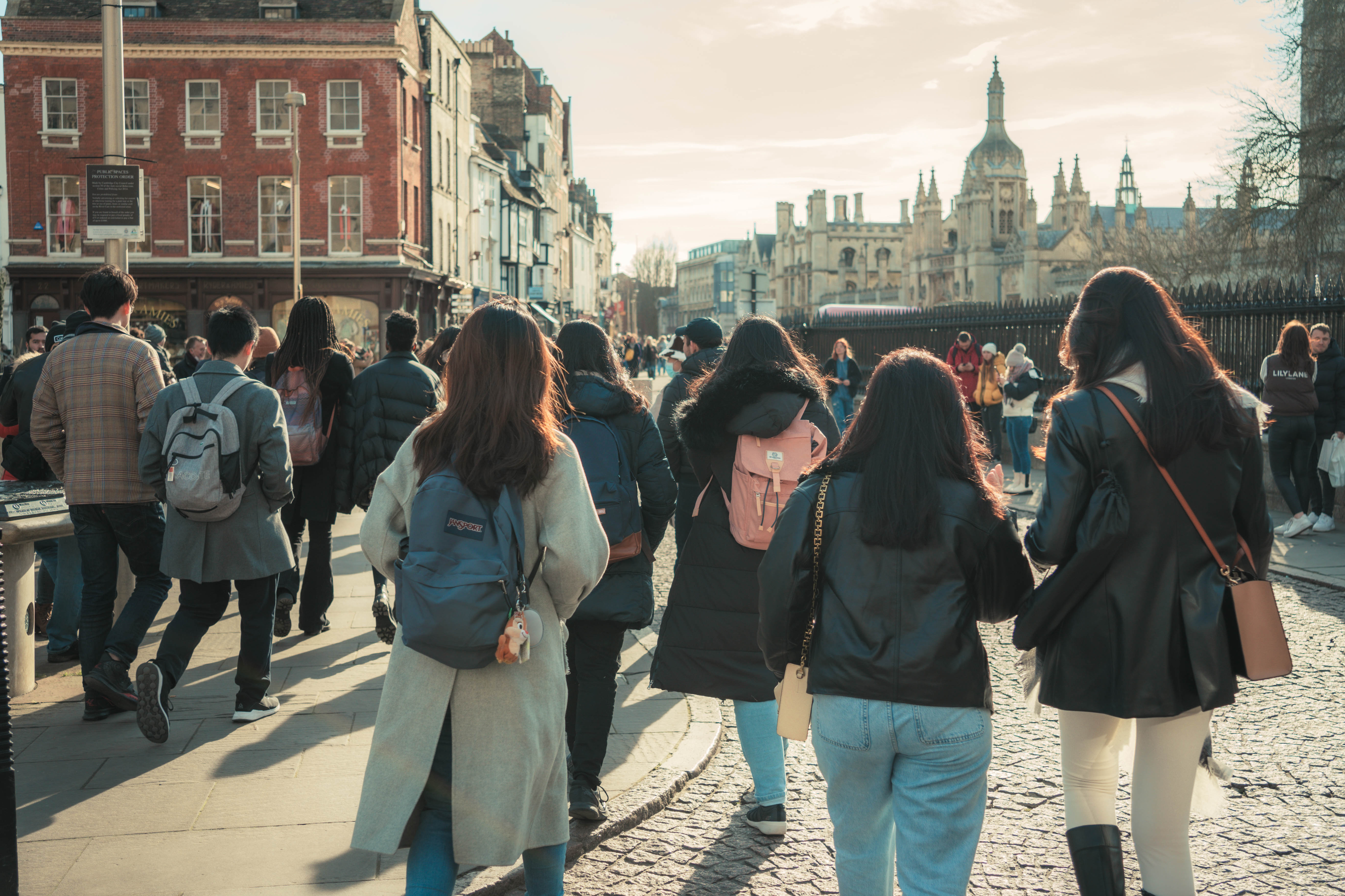a group of people standing in front of a crowd