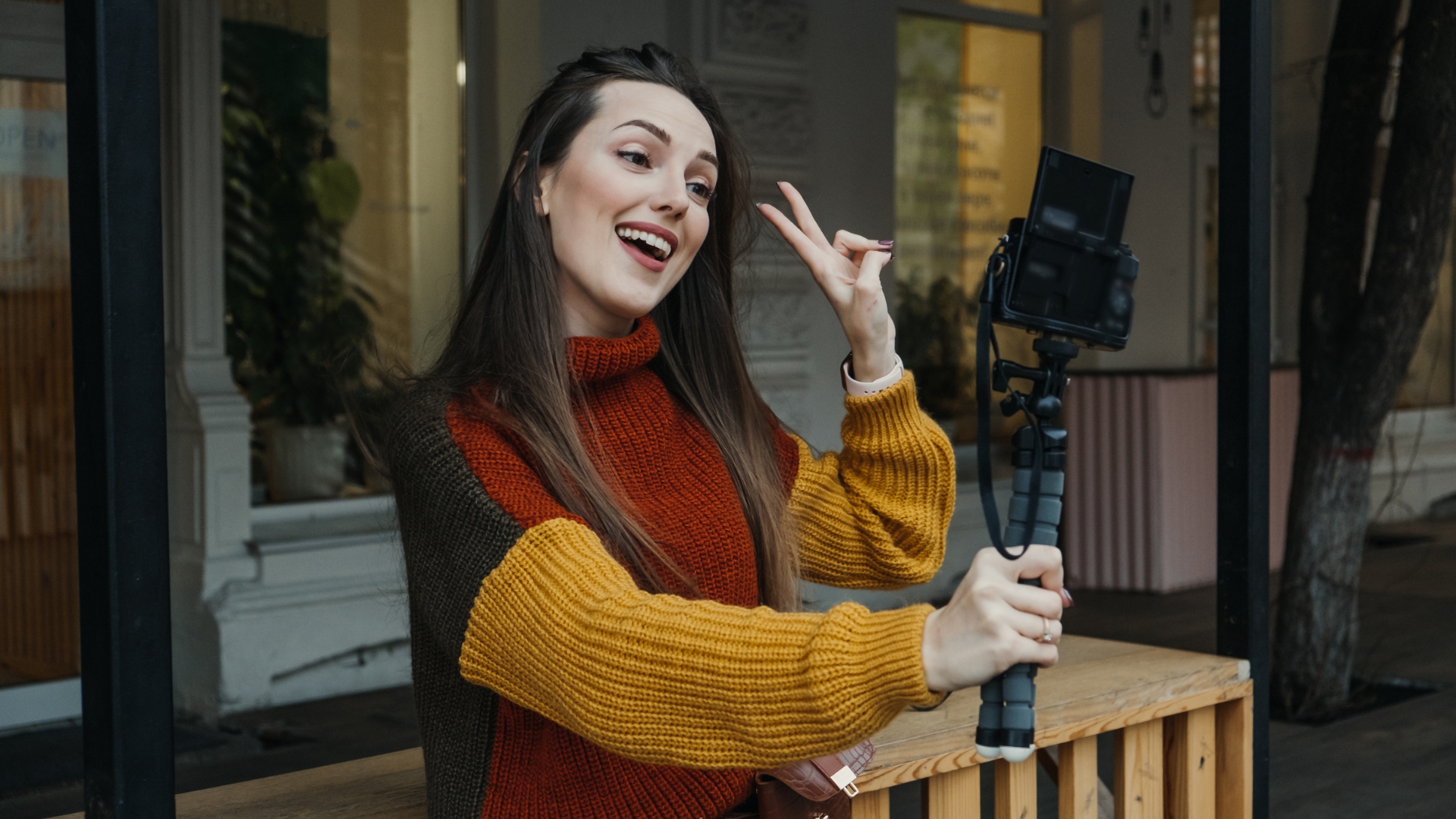 a woman holding a cell phone