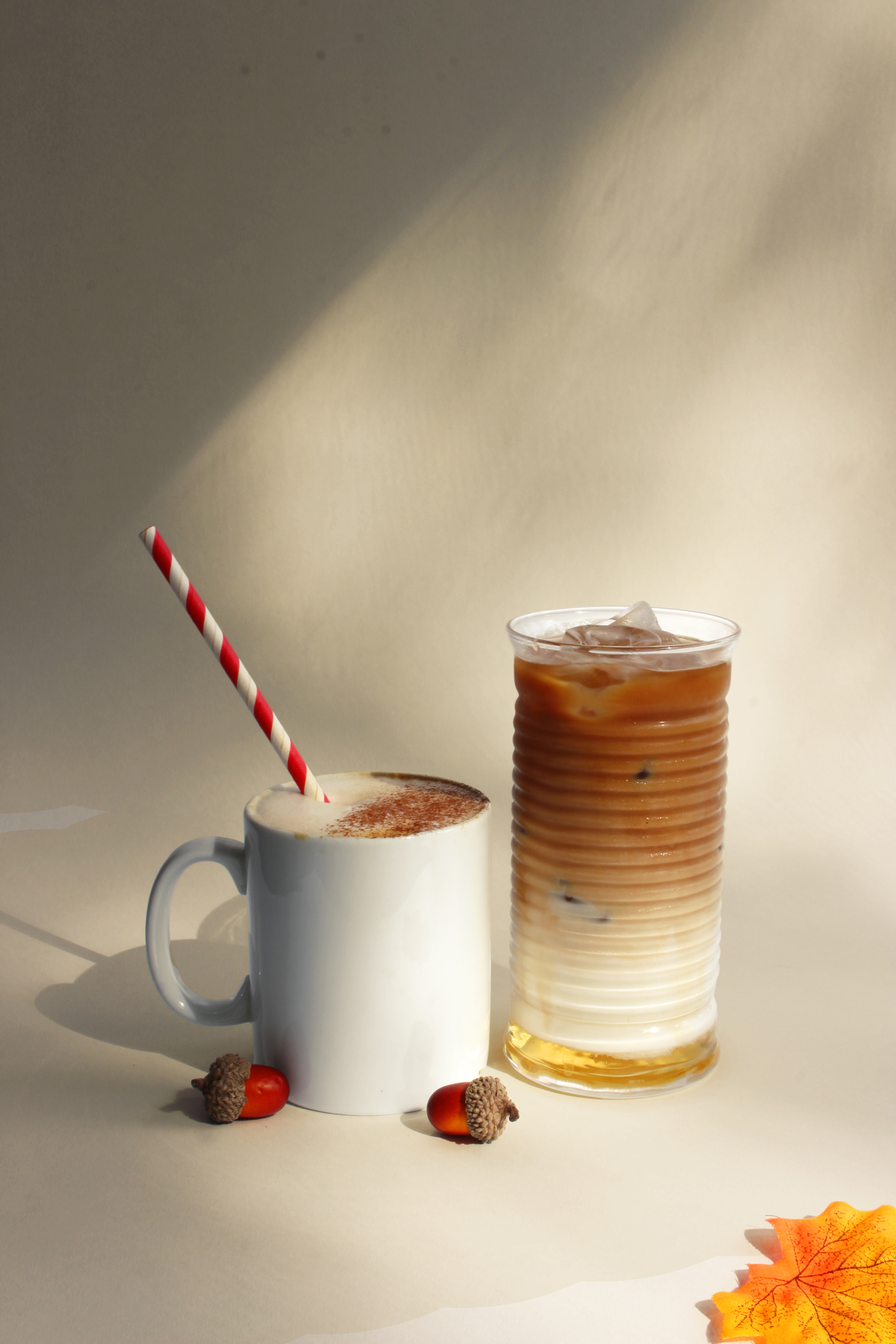 a cup of coffee and a glass of ice coffee
