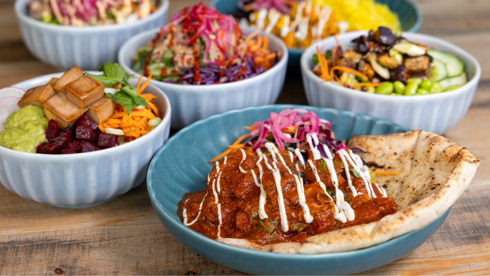 bowls of food on a wooden table