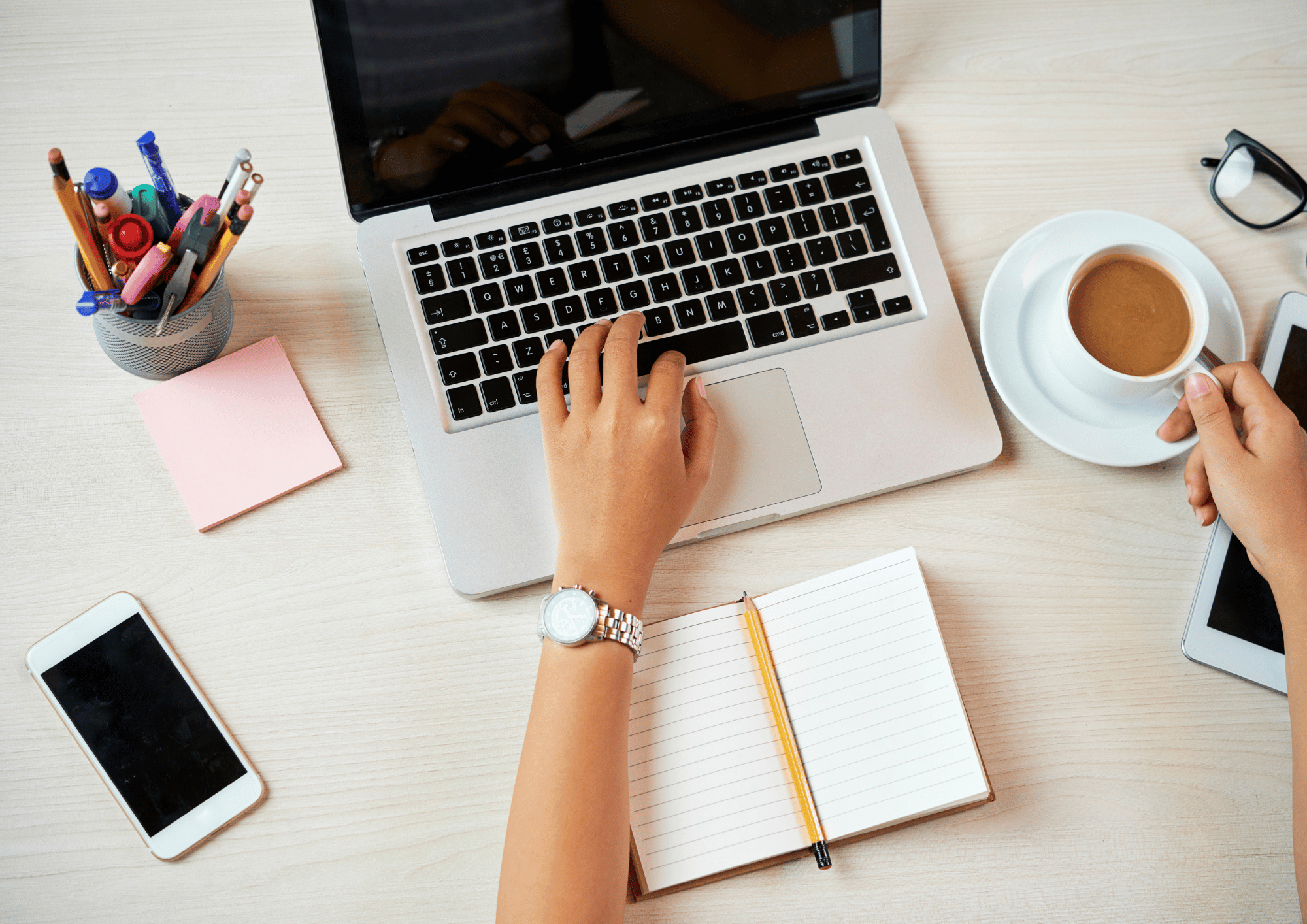 a laptop computer sitting on top of a table