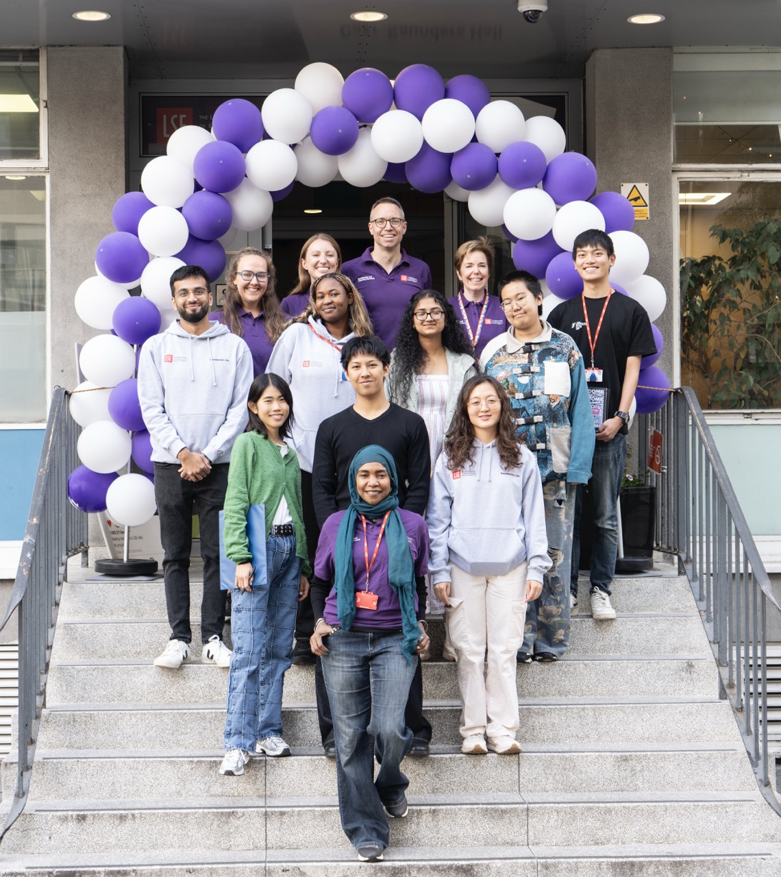 people standing outside Carr-Saunders