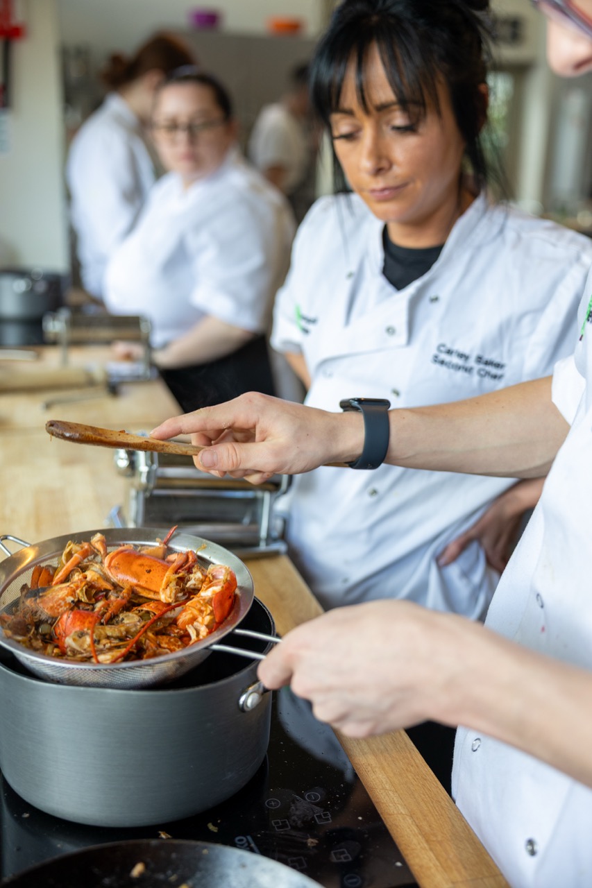 a person cooking in a kitchen