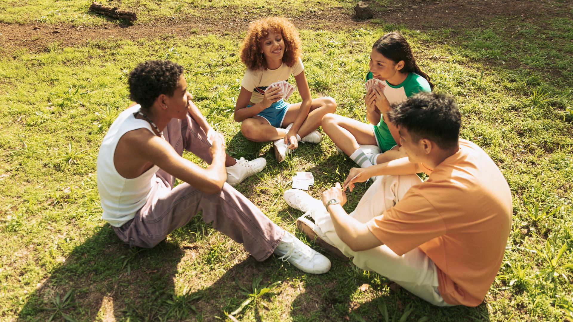 Friends sitting on the grass