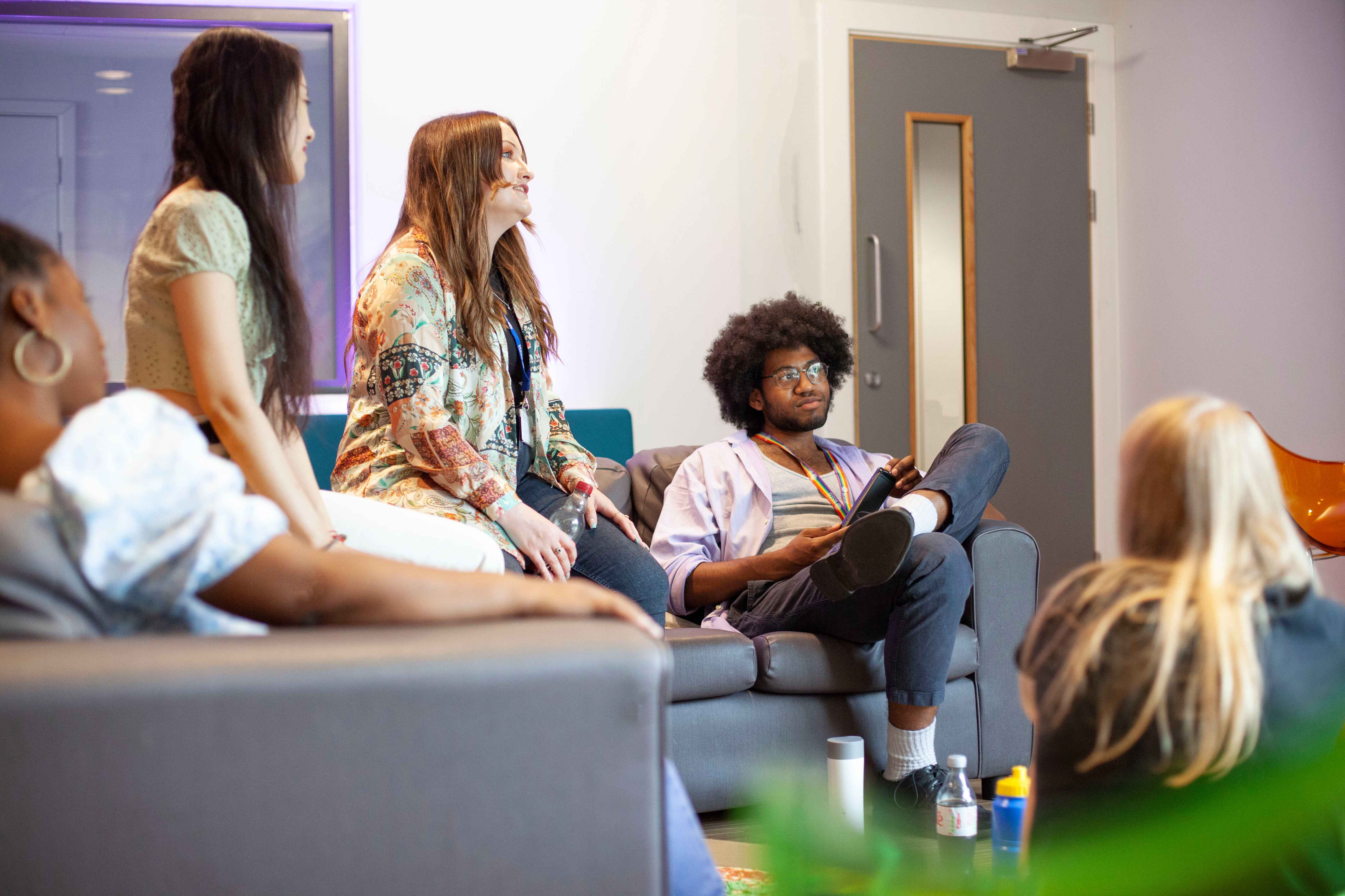 people chatting in living room