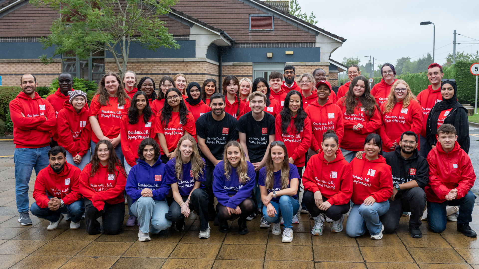 a group of people posing for a photo