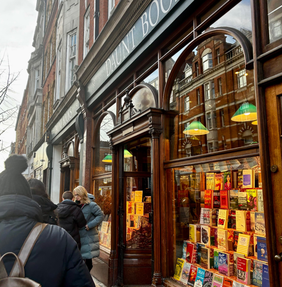 a person standing in front of a store