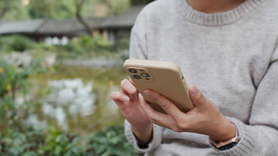a hand holding a phone