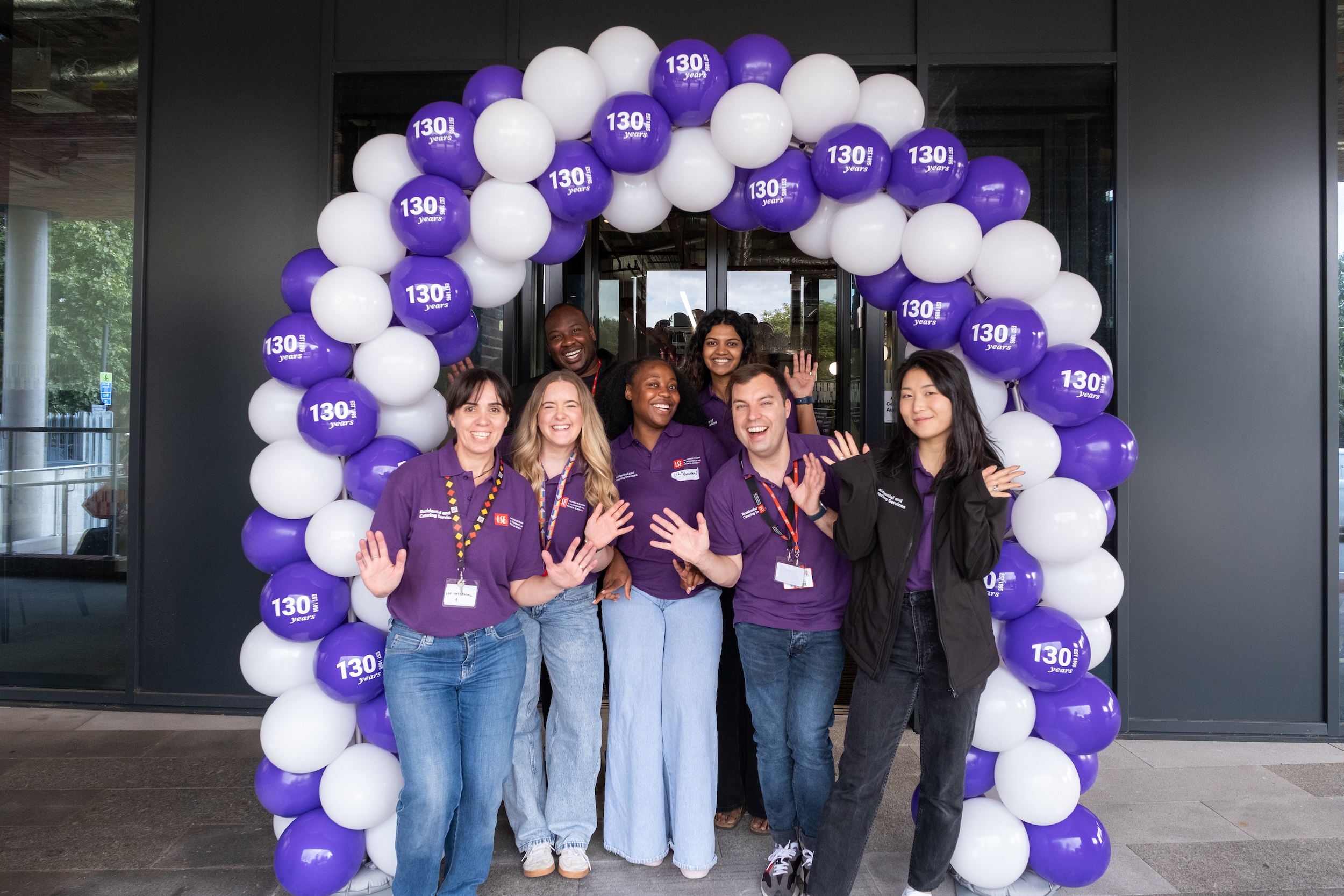 a group of people posing for the camera