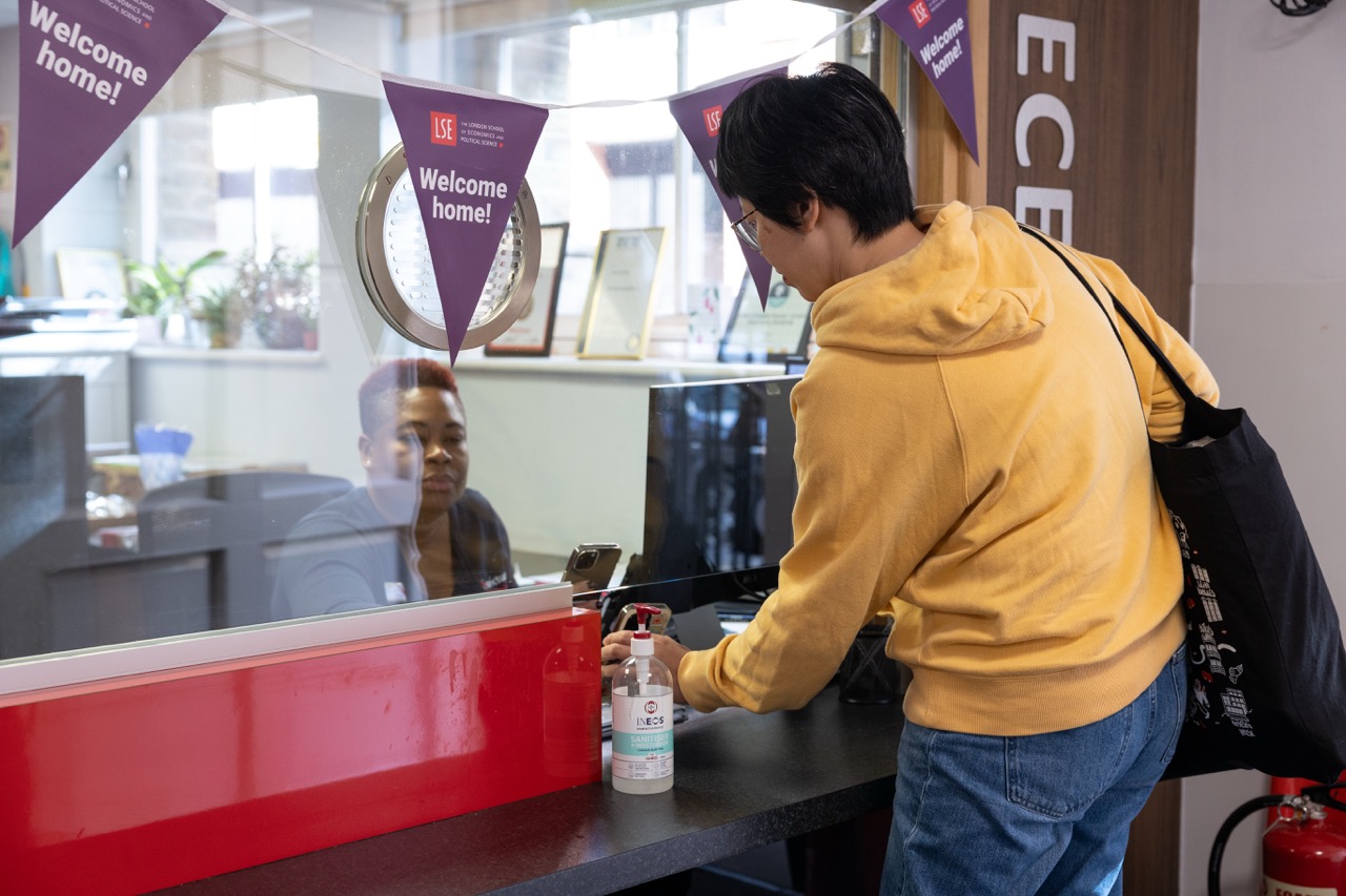 a man standing in front of a counter