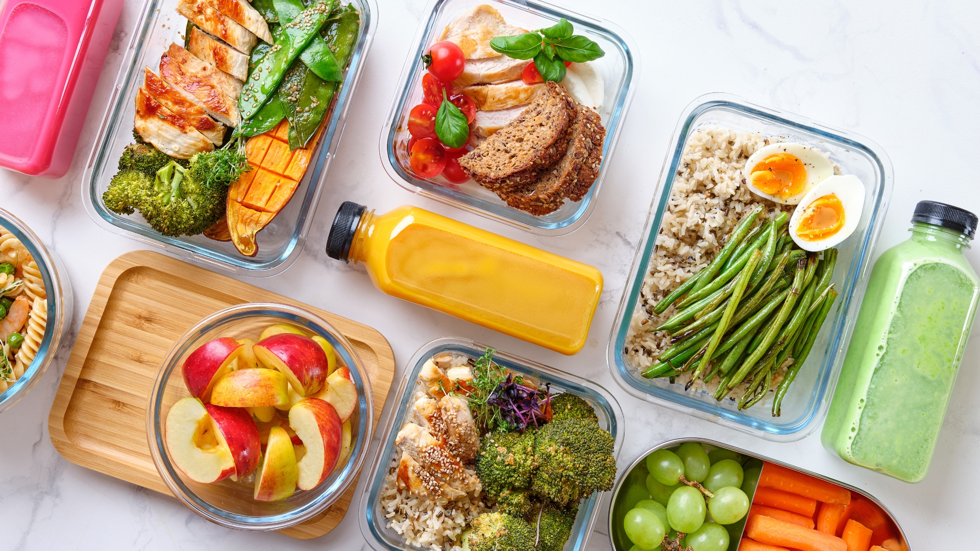 a plastic container filled with different types of food on a table